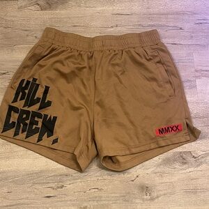 Men’s Brown Graphic Shorts with Black and Red Accents. Size M